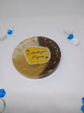 Black and gold coaster